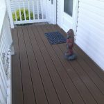 Trex Deck, Beautiful white vinly railing. Construction done by Bob Hall. Contact us for information.