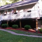 Yretto Antko Beautiful Deck. Consruction done by Don Maki. Trex clam shell, with white vinyl railings.